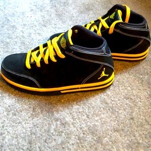 NEW never worn Black and Gold Jordan Shoes